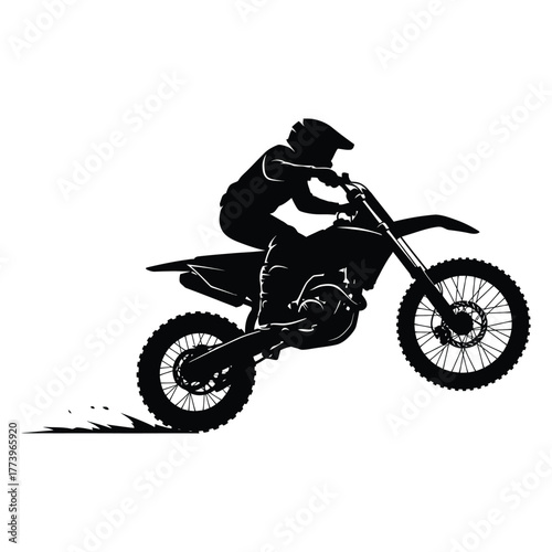 Silhouette of a motocross rider jumping high on a dirt bike against a white background