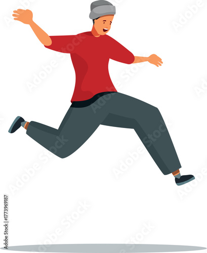 Happy young man wearing beanie jumping and running, celebrating success