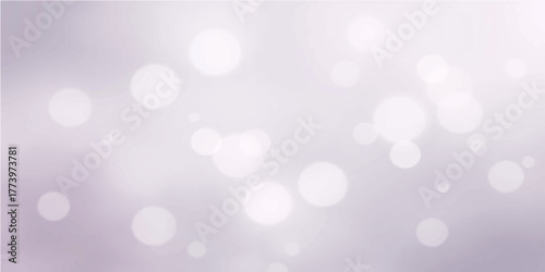 Bright blue and silver abstract bokeh background with defocused light, perfect for a winter holiday or Christmas design texture