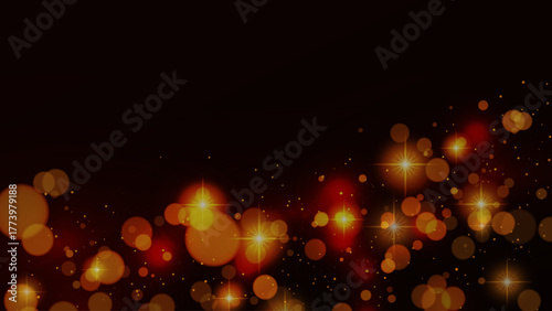 Sparks and golden stars shine light on a dark background. Christmas party new year eve concept.