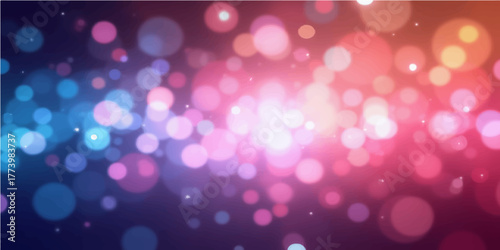 Colorful bokeh lights create an abstract, bright purple and pink holiday background with a festive Christmas glow