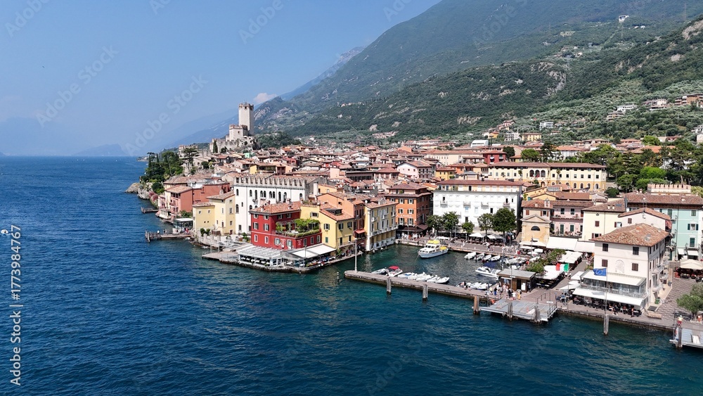 Fototapeta premium Harbour Malcesine Lake Garda Italy high angle drone,aerial blue sky