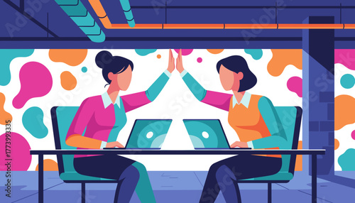Successful women highfiving at laptops celebrating teamwork and achievement in a vibrant office