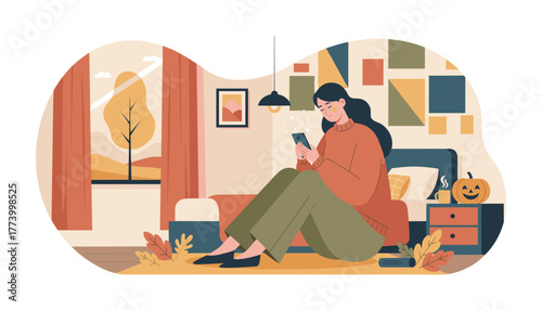 Woman uses smartphone in a cozy autumn room Fall colors jackolantern decor and relaxation