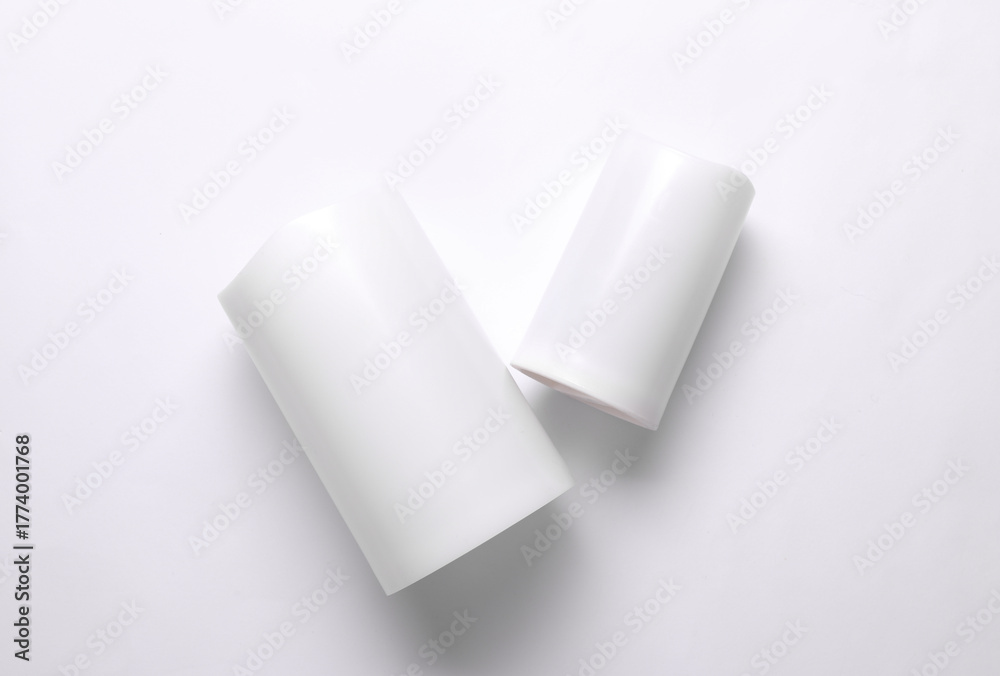 Obraz premium Two led candles on a white background