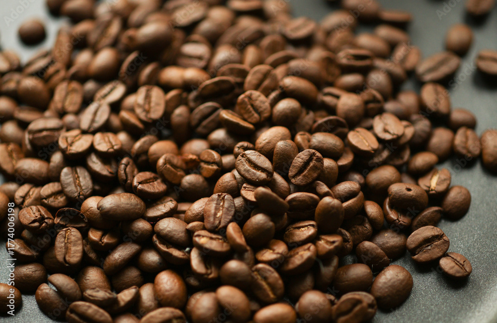 Fototapeta premium Coffee beans on a frying pan