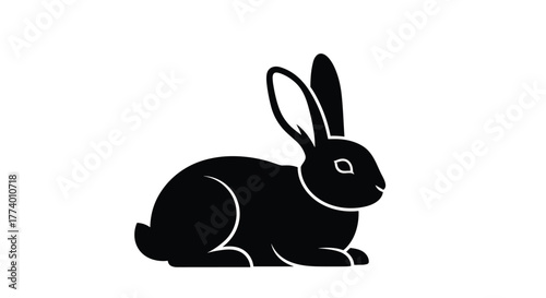 A stylized graphic illustration of a black rabbit, presented as a clean silhouette with its ears alert and a subtle eye detail, sitting calmly and isolated on a pure white background.