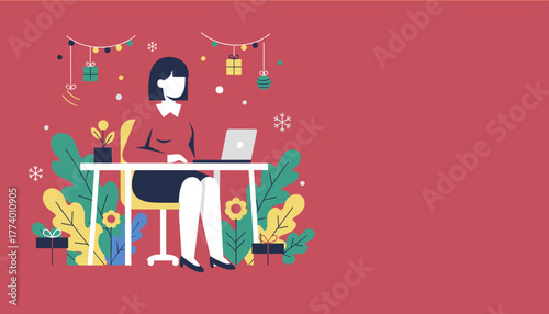 Professional woman working on a laptop in a festive decorated office setting