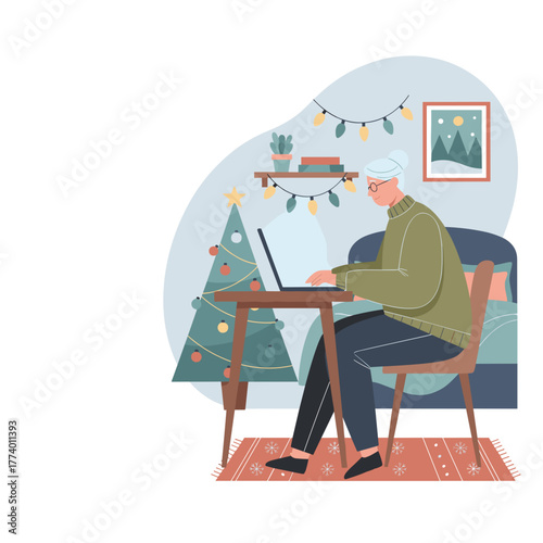 Senior woman working on laptop at home near Christmas tree Remote work cozy holidays
