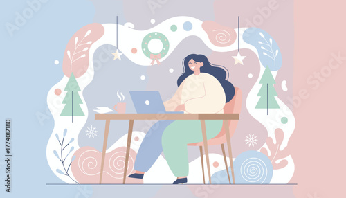 Happy woman working remotely on laptop at desk with soft pastel winter holiday decorations