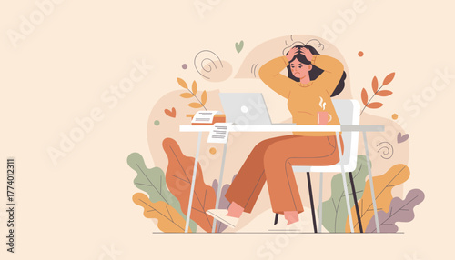 Stressed woman holding her head at a desk with a laptop frustrated by work or financial problems