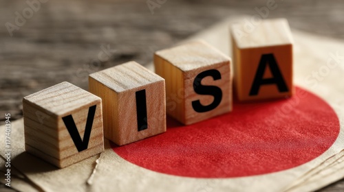 Visa application process with wooden blocks and Japanese flag representation on textured surface