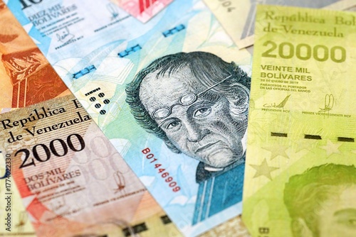 Wallpaper Mural Venezuelan Bolivar currency money bills in big amount. Bunch of VED currency banknotes with different denomination close up Torontodigital.ca