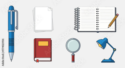 Collection of stationery and office supplies including pen notebook book lamp and magnifying glass.