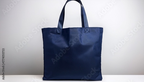 navy blue canvas tote bag on a white background