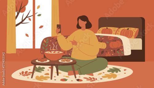 Autumn comfort Woman uses smartphone while enjoying warm soup and cookies indoors
