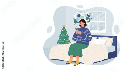 Woman using phone on bed during winter holidays with Christmas tree nearby