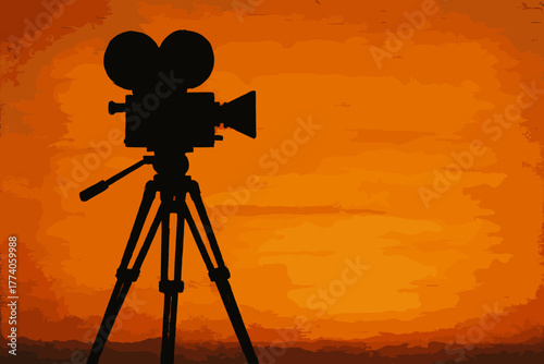 Silhouette of a vintage film camera with reels on a tripod against a warm orange background, evoking a classic cinematic feel.