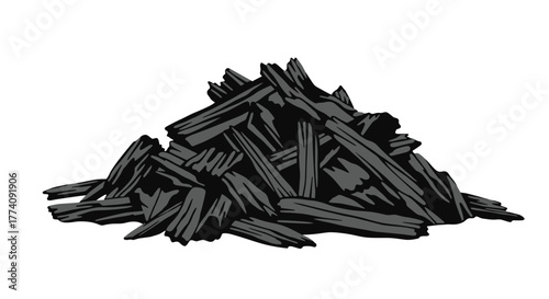 Pile of dark charcoal pieces for barbecue grilling or artistic sketching projects