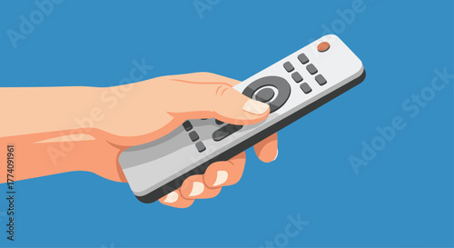 Hand holding a modern remote control, ready to select entertainment or change channels, offering convenience and control