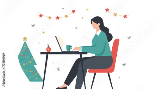 Professional woman working remotely on her laptop during the festive Christmas holiday season