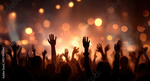 A joyful crowd silhouetted with hands raised high, celebrating against a vibrant rock and roll party backdrop filled with dazzling bokeh lights, capturing the spirit of live music and festivity.
