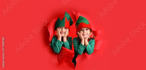 Cute little elves on red ba...