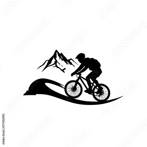 Dynamic cyclist conquers rugged mountain trails on thrilling adventure