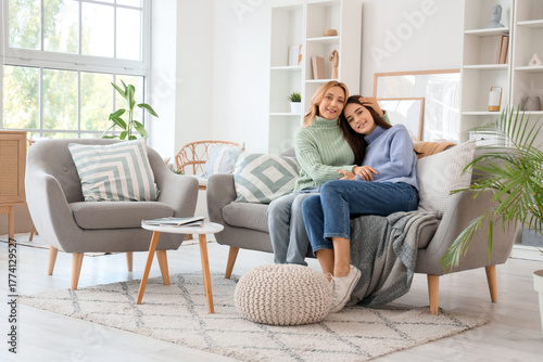Middle-aged woman hugging h...