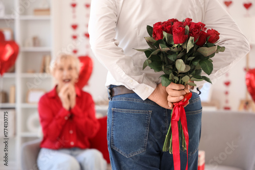 Mature man greeting his sho...