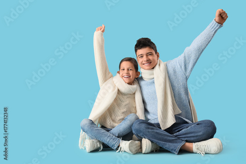 Happy brother and sister hu...