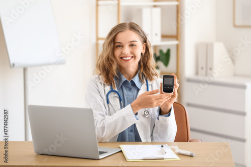 Female doctor with glucomet...