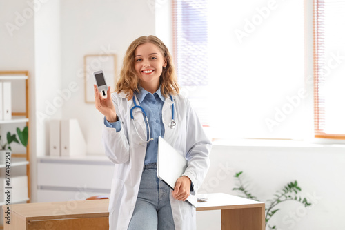 Female doctor with laptop a...