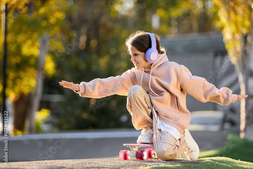 Little girl with headphones...
