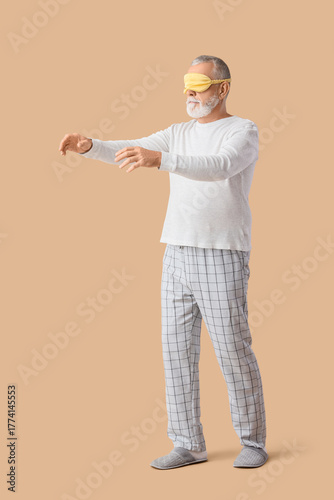 Senior male sleepwalker in ...