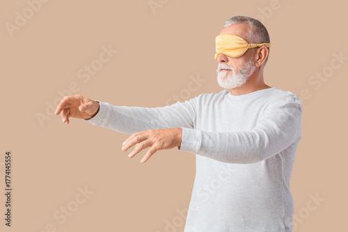 Senior male sleepwalker in ...