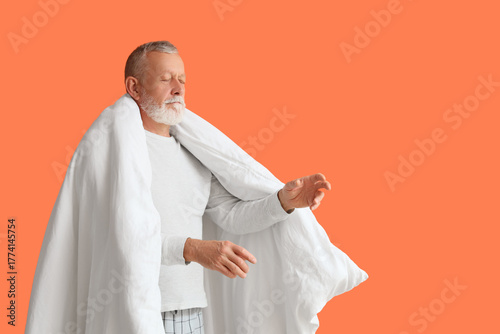 Senior male sleepwalker in ...