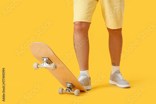 Legs of senior man with ska...