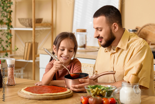 Cute girl with her father a...
