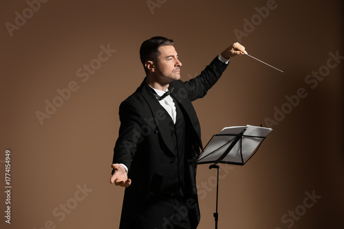 Young male conductor with n...