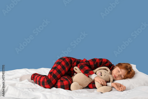 Cute girl in pajamas with p...