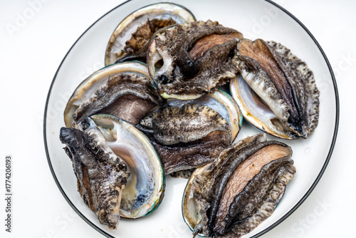 Fresh abalone ingredients on a pure white background