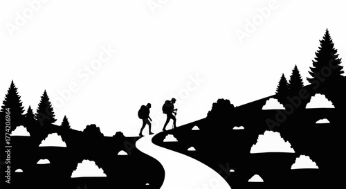 Silhouette of two hikers with backpacks on a mountain trail.