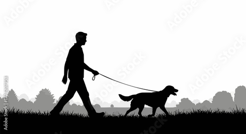 Silhouette of a man walking his dog on a leash.
