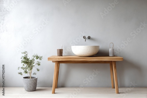 Modern bathroom vanity with vessel sink and plant.
