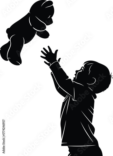 Child tosses teddy bear silhouette