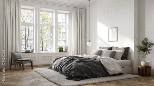 Serene Nordic bedroom with gray bedding, white interior, herringbone parquet, and wide window lighting up the space