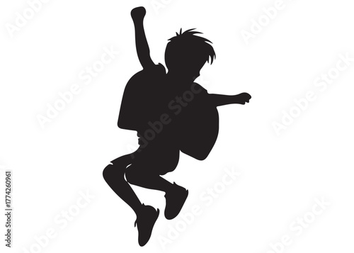 Silhouette of a cheerful schoolboy jumping with backpack