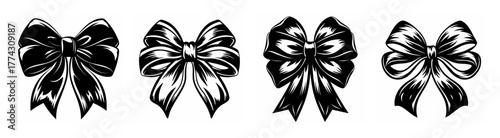 Collection of four ornate black bows with flowing tails decorative ribbons