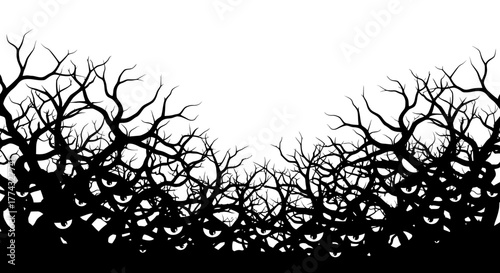 Eerie silhouette of spooky bare branches with watchful eyes lurking in the shadows, perfect for Halloween or horror themes
